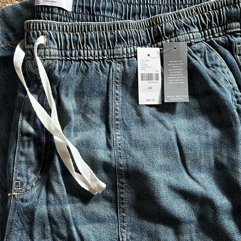 Lane Bryant wide leg tie waist medium wash destructed jeans NWT size 28 short